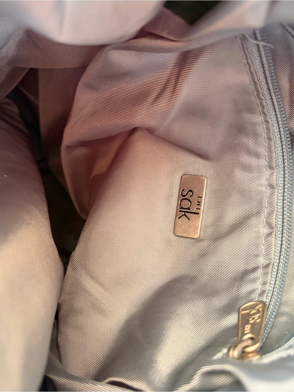 The Sak Light Gray Crochet Crossbody with Logo Charm